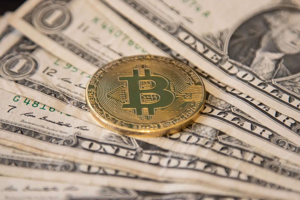 Bitcoin Illustration On United States Dollar USD Banknotes