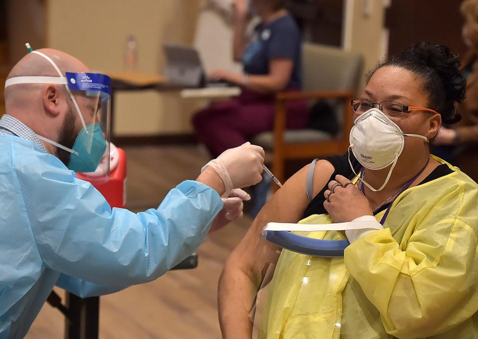 Staff at long term nursing home get Covid-19 vaccine