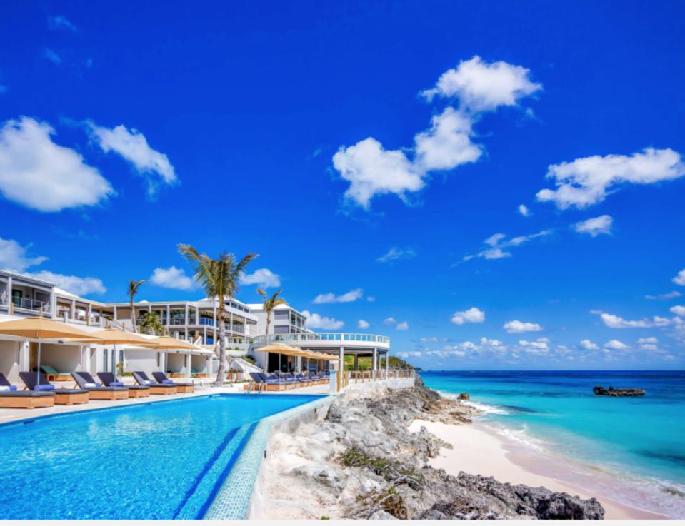 View of The Loren at Pink Beach: the pool, and the beach