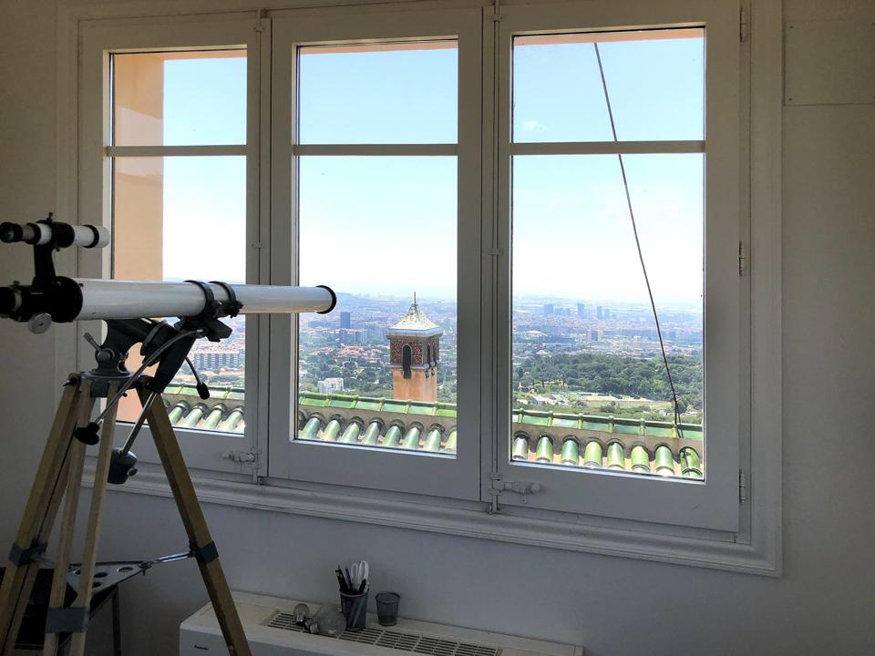 barcelona modernist home with watchtower overlooking city