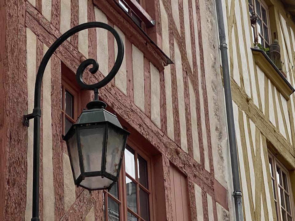 Ancient half-timbered walls and street light in Orléans