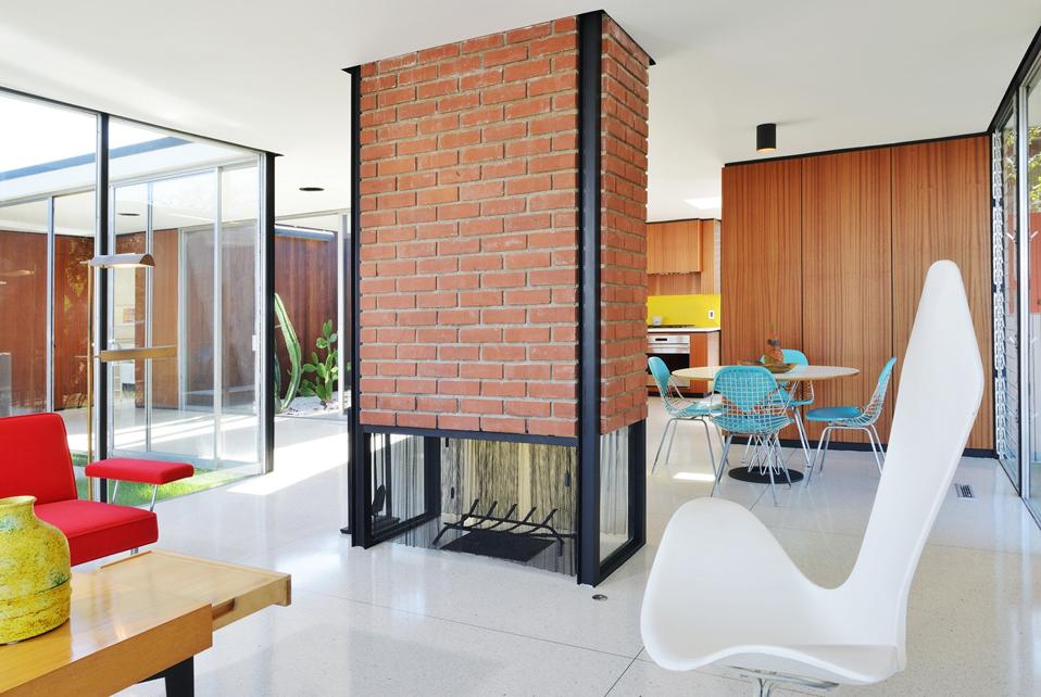 brick fireplace inside restored kuderna house hollywood hills craig ellwood