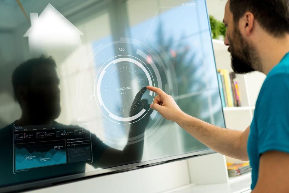 Man working on a touch screen