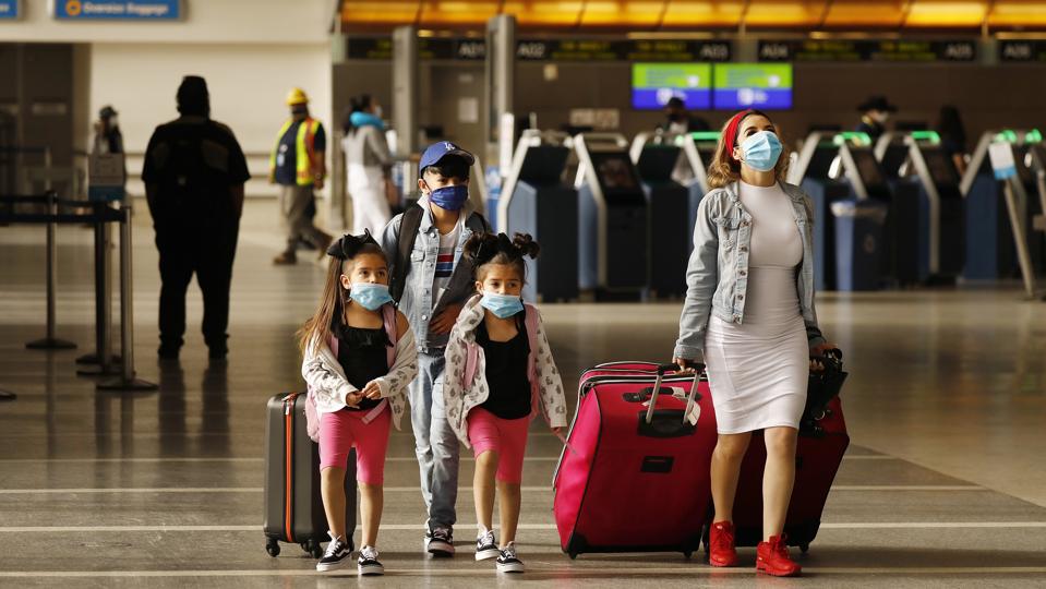 Los Angeles International Airport is now requiring travelers to wear face covering to help keep fellow passengers and crew safe by limiting the spread of the coronavirus Covid-19.