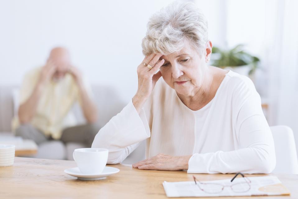 Sad senior woman after quarrel