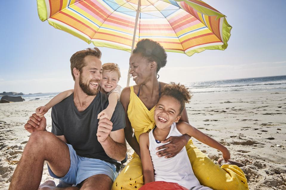 Happy family goes on a vacation after a long year dealing with the pandemic