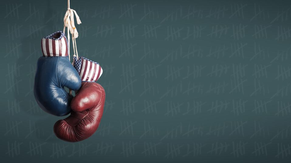 blue and red boxing glove symbolizing political battles