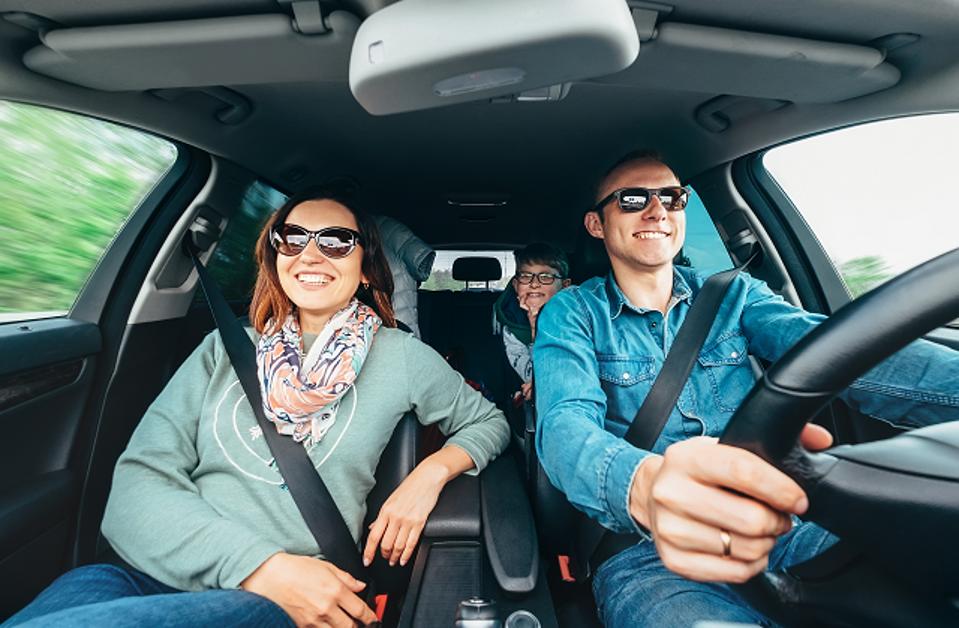 Family Riding In Car