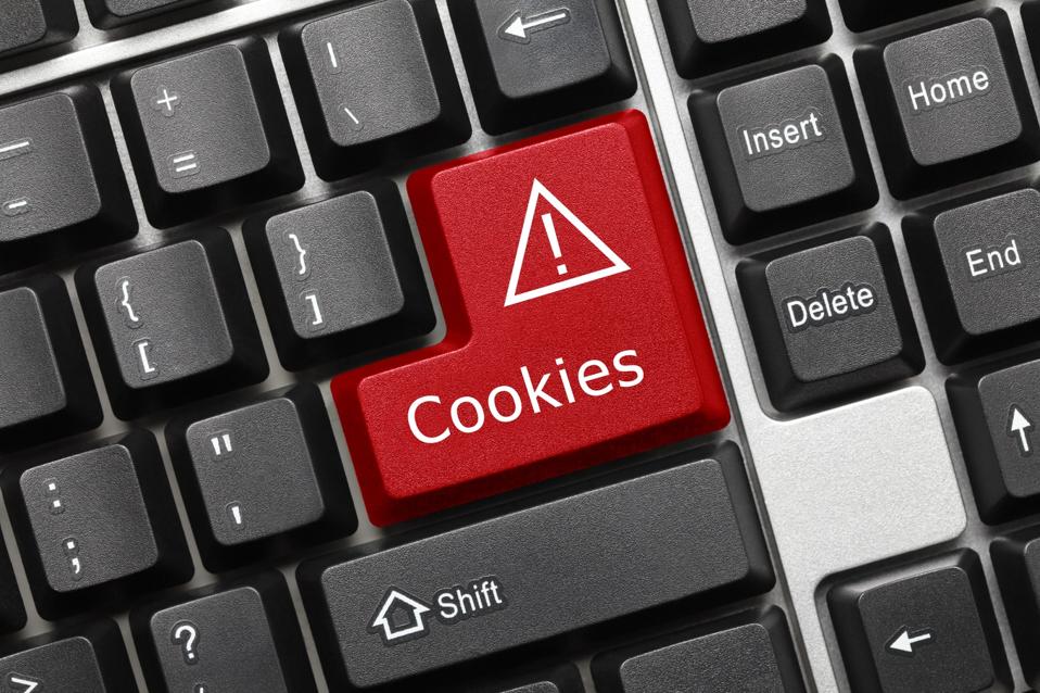 Cookies with red alert icon on a keyboard