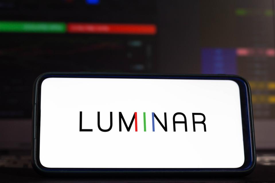 In this photo illustration a Luminar logo seen displayed on...