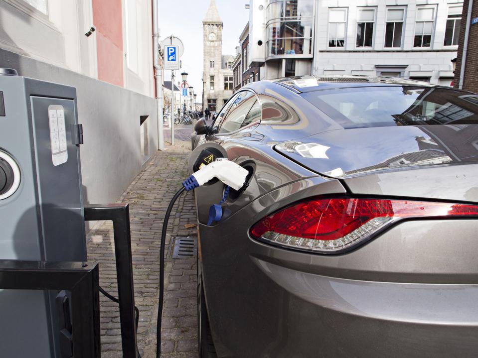 Electric car at recharging station