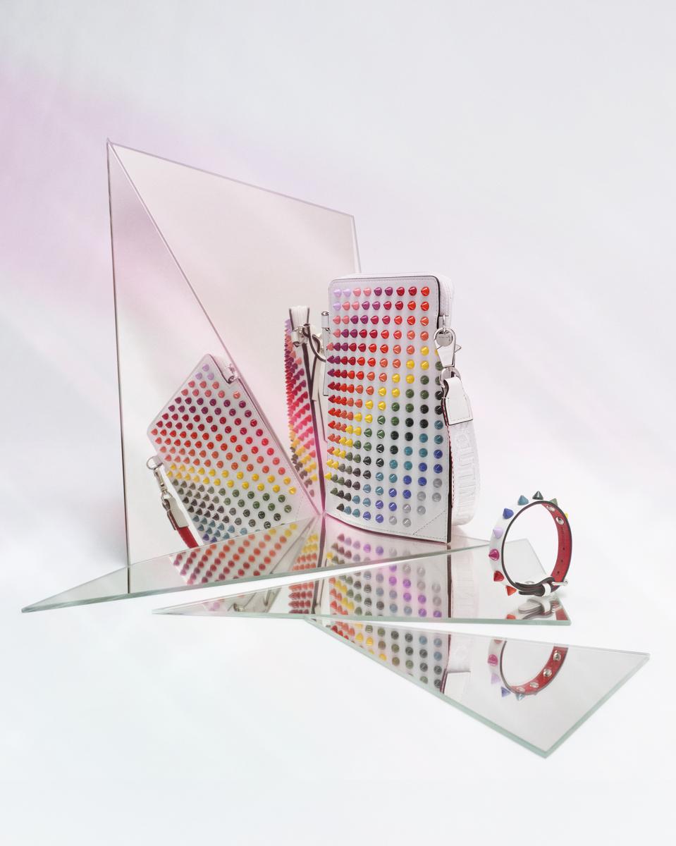 Rainbow-colored handbag and accessory designed by Christian Louboutin for Mytheresa.