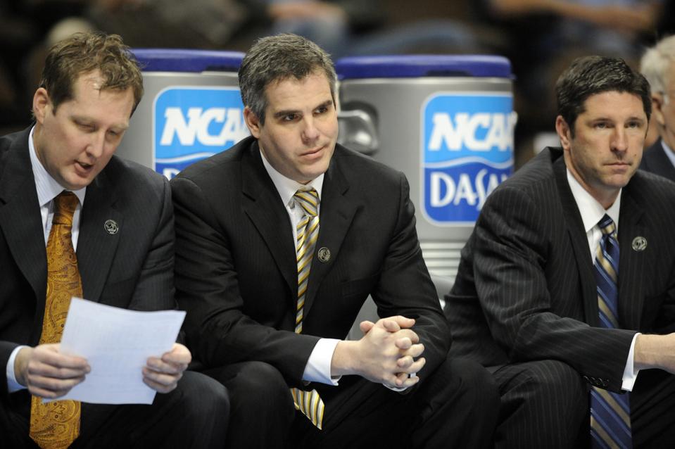 (AC) DENVER, COLORADO--MARCH 20TH--2008--Oral Robert's head coach, Scott Sutton, center, sits inbetween assistant coach, Conley Phipps, left, and Tom Hankins, right, late in the in the second half of play against Pittsburgh during the 1st round of the NCA