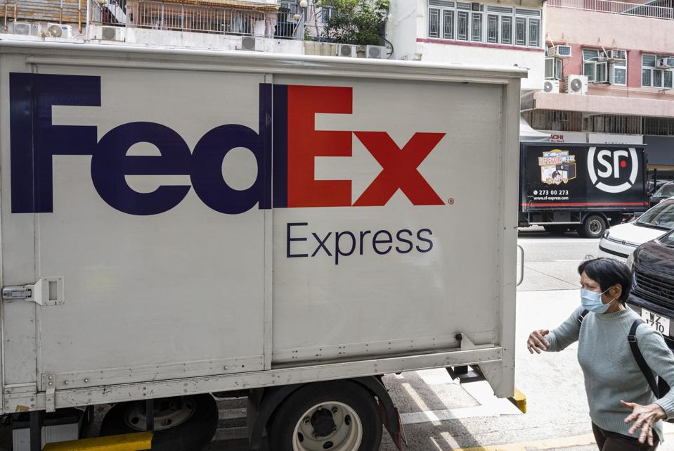 American FedEx Express delivery and Chinese multinational...