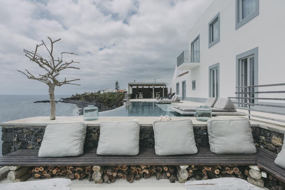The pool at White Exclusive Suites & Villas in the Azores, Portugal, is just above the sea