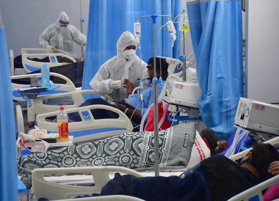 On May 6, 2021, patients struggling for breath receive treatment in the ICU ward at Mulund Jumbo's COVID-19 center in Mumbai, India.