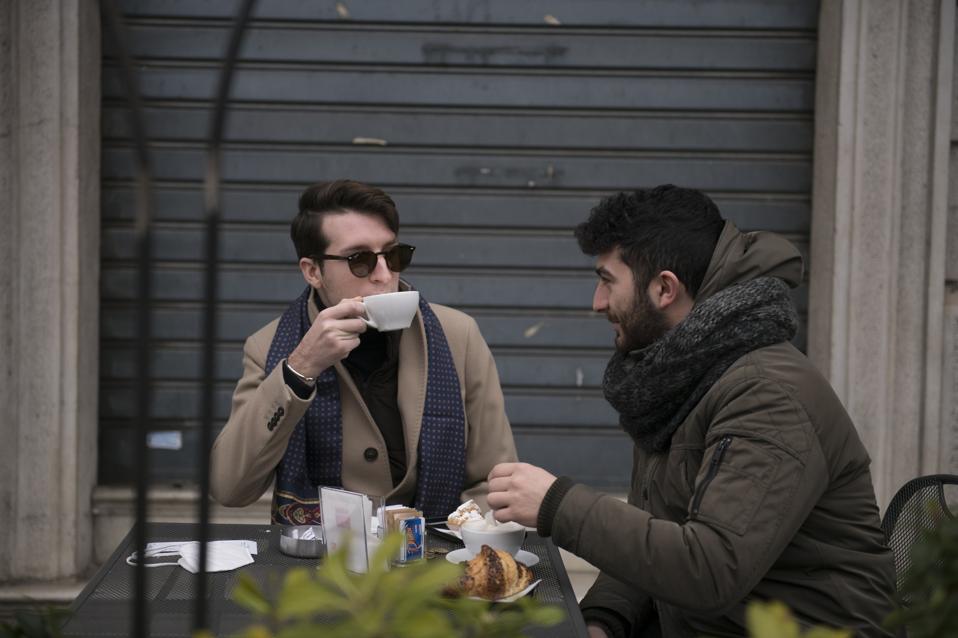 CODOGNO, ITALY - FEBRUARY 21:  People drink coffee at a cafe near the Codogno Church in Codogno, Italy.
