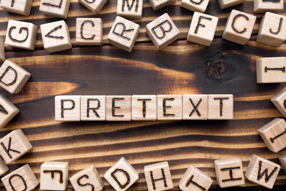 word pretext composed of wooden cubes