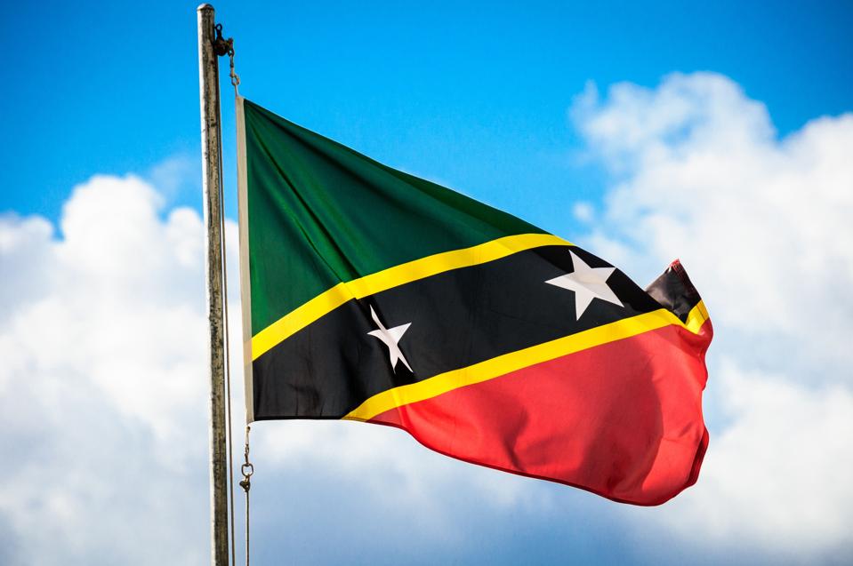 The green, yellow, black, red and white flag of St. Kitts and Nevis