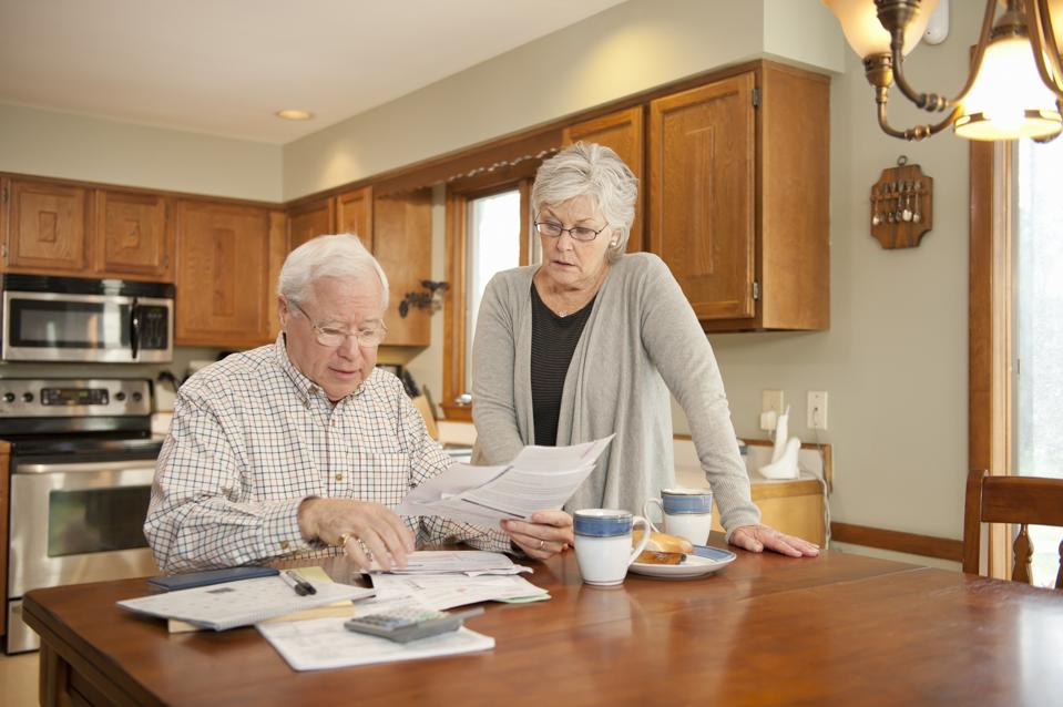 Mature Couple Looking at Household Bills