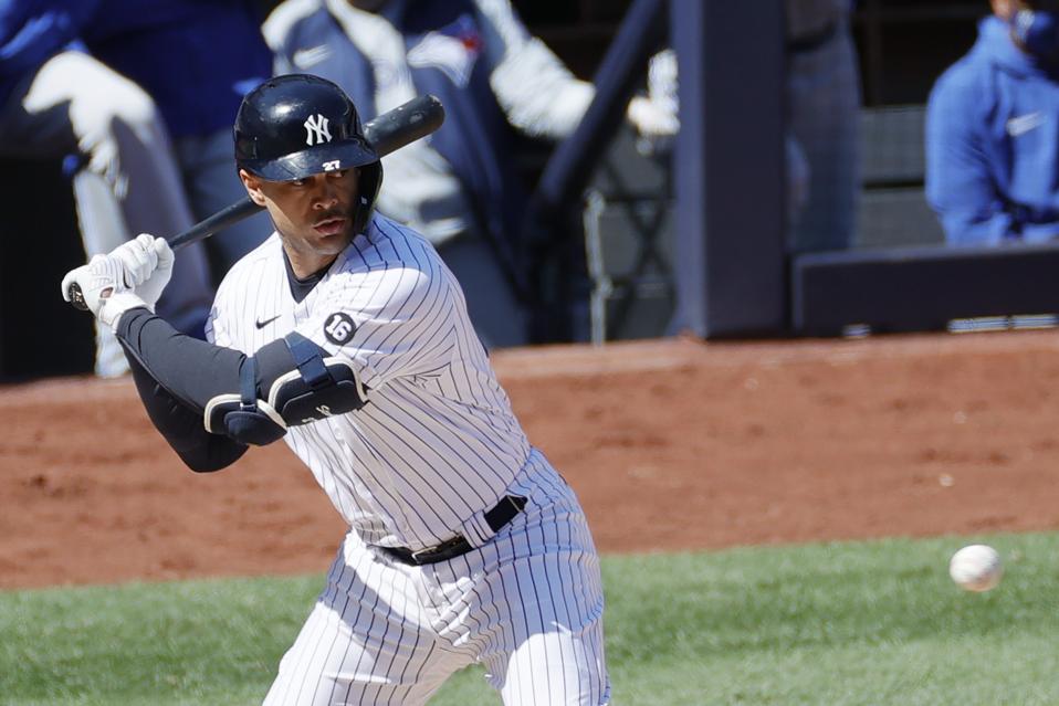 Right-handed designated hitter Giancarlo Stanton focuses in on a pitch.