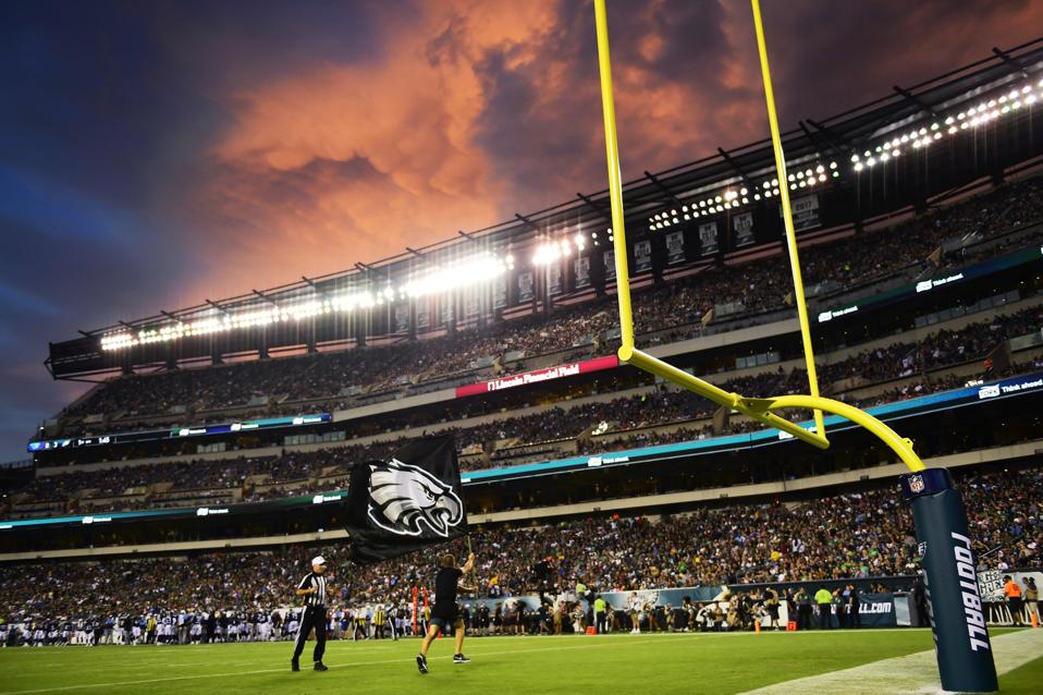 PHILADELPHIA, PA - AUGUST 08: A Philadelphia Eagles flag-bearer flies the team logo after the first score of the game against the Tennessee Titans during the first quarter of a preseason game at Lincoln Financial Field on August 8, 2019 in Philadelphia, Pennsylvania. (Photo by Corey Perrine/Getty Images)