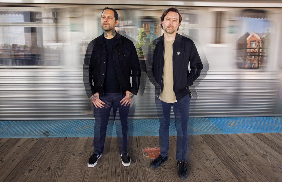 Tim McIlrath (left) and Joe Principe (right) of Rise Against pose in suburban Chicago as the group readies release of the new studio album 'Nowhere Generation' on Friday, June 4, 2021 (Photo by Barry Brecheisen)