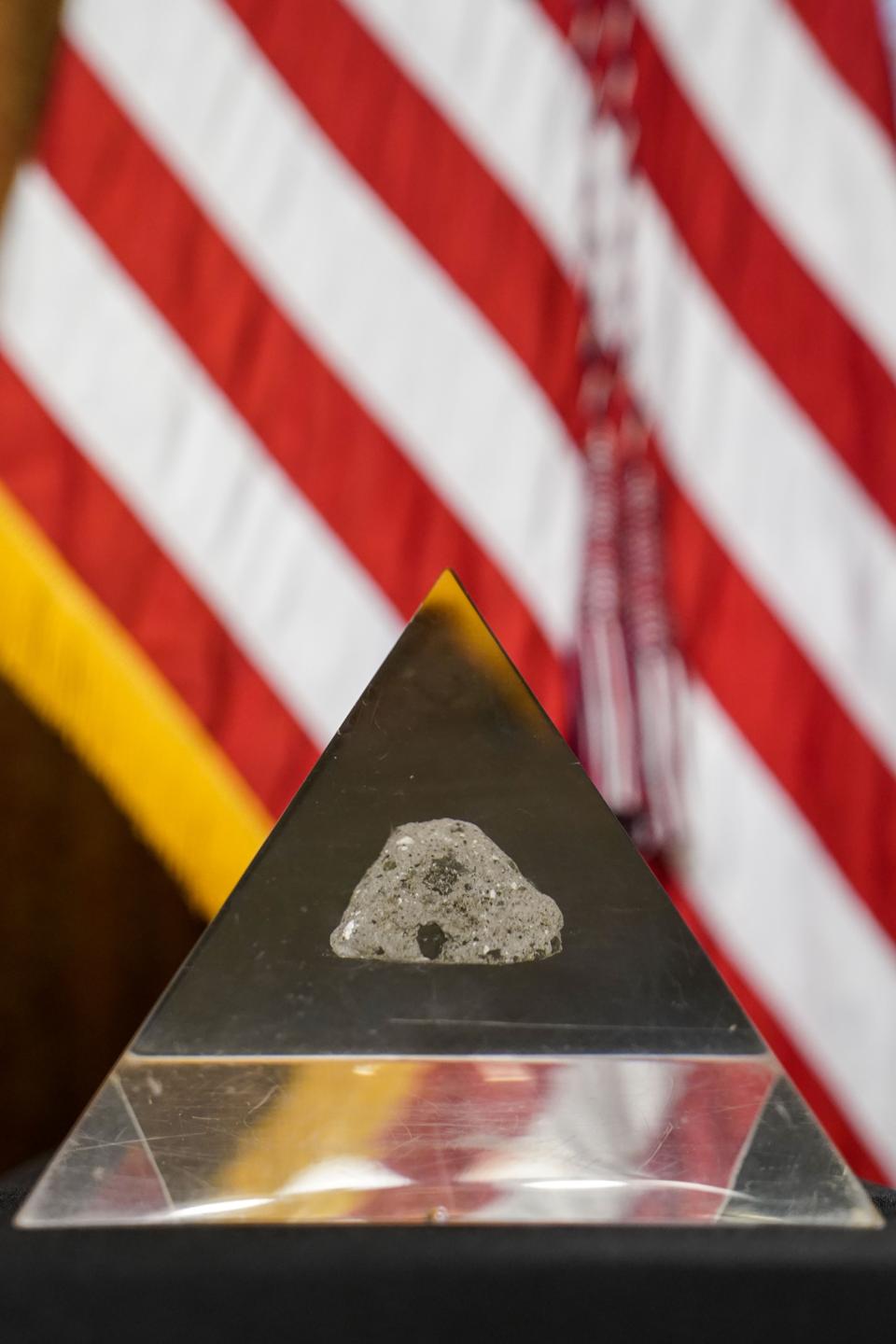 Moon rock on table as Vice President Kamala Harris swears in Bill Nelson as NASA Administrator