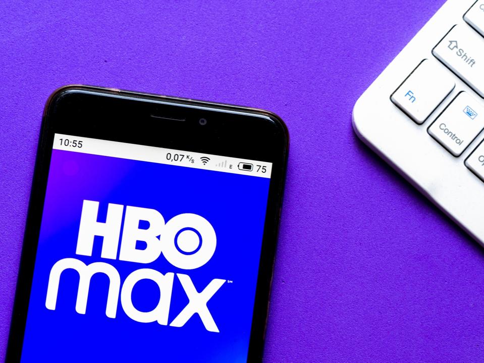 In this photo illustration an HBO Max logo seen displayed on...