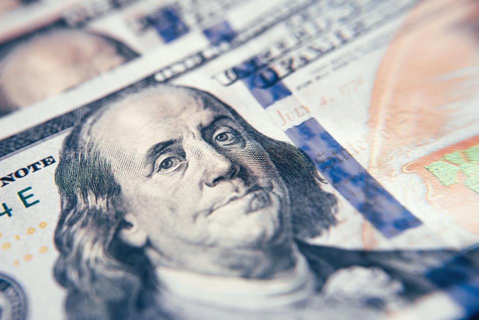 American cash dollars close-up. One Hundred Dollar Banknotes.