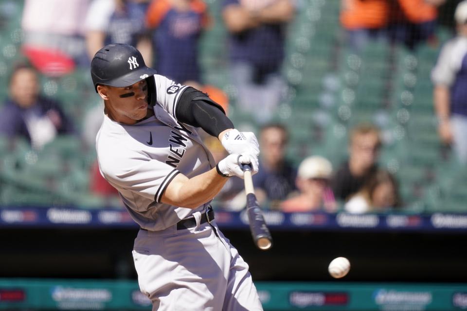 Right-handed hitter Aaron Judge swings at a pitch and misses it.