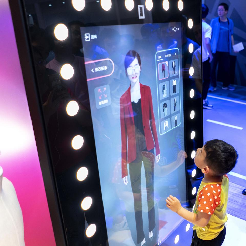 People are experiencing the AI fitting technology while...