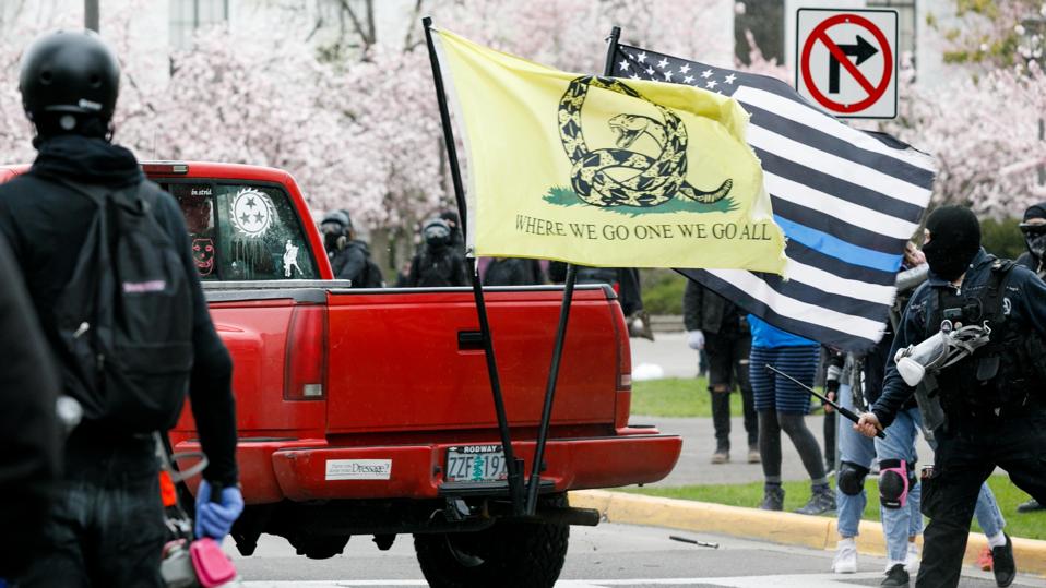 Opposed groups stage protest and counter-protest in Oregon