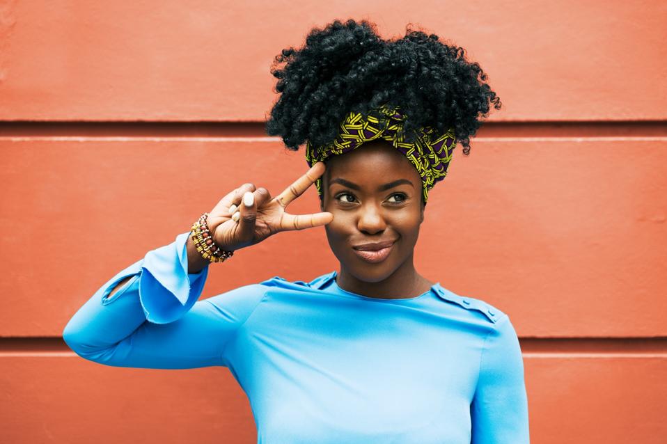 Woman making social media pose