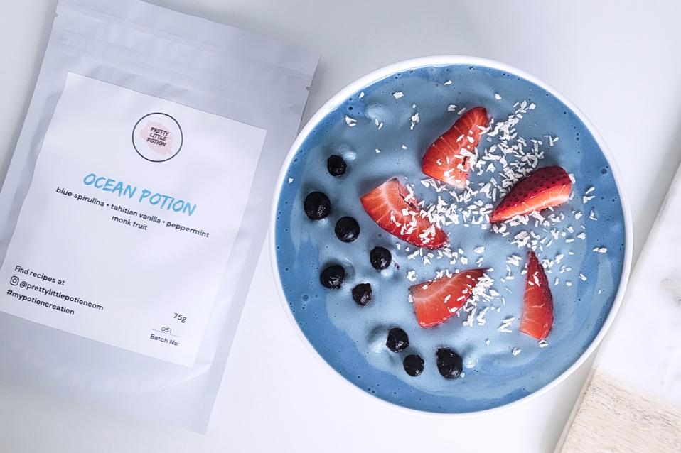 A bowl of yogurt made with Pretty Little Potion's Ocean.