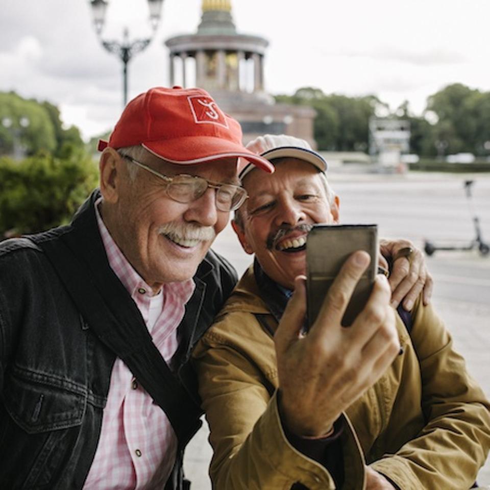 Mature Gay Couple Taking Selfie Together