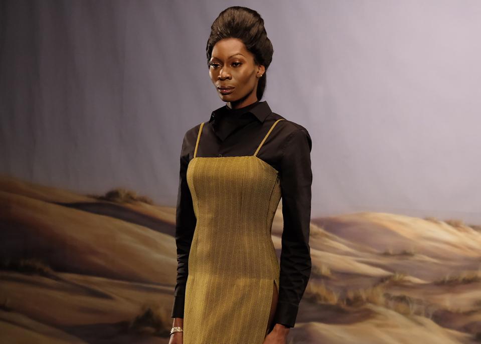 Dominique Jackson wearing Kenneth Ize behind the scenes from ″Passage″ by Solange Knowles and Saint Heron for The International Woolmark Prize.