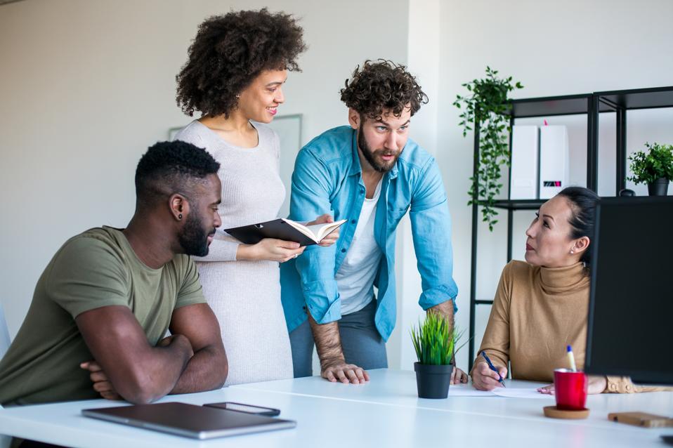 Modern business office with team members