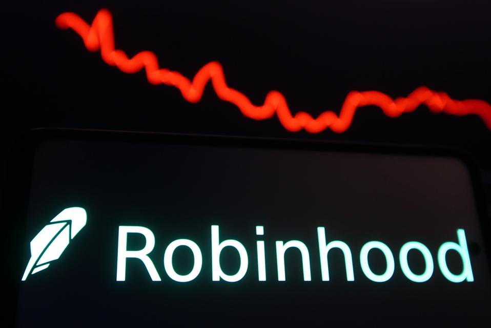 In this photo illustration a Robinhood logo of a U.S.