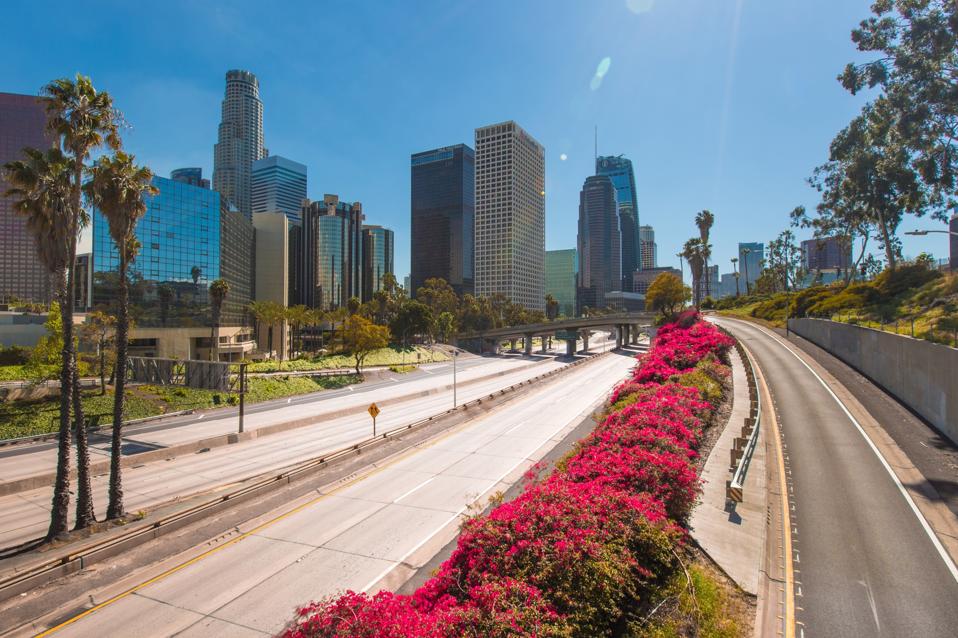 Los Angeles during the corona virus pandemic. Empty freeways no traffic on the 110 freeway. City under lockdown.