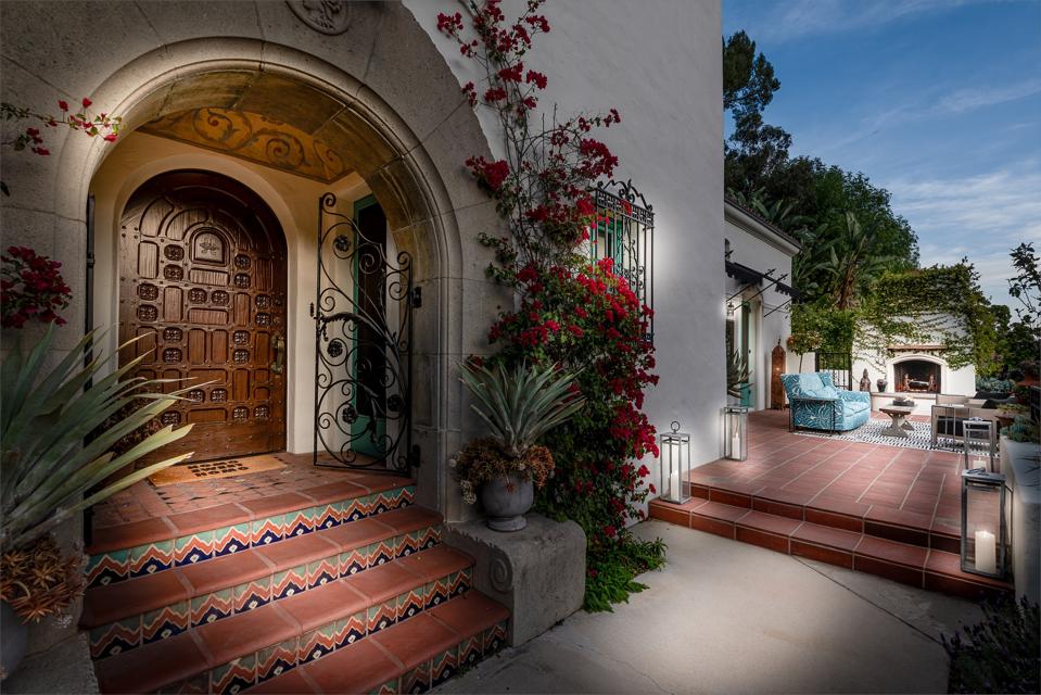 Spanish Colonial-style with a carved wooden door