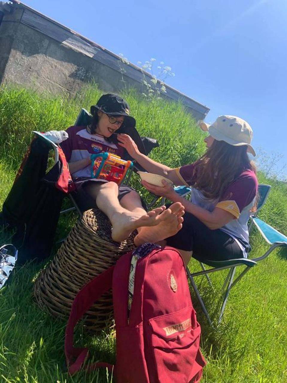 Billy and Charlotte Caldwell enjoy a snack as they rest during their 1,000-mile trek across the U.K.