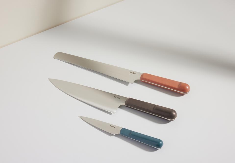 Our Place knife trio in pink, smoke, and teal