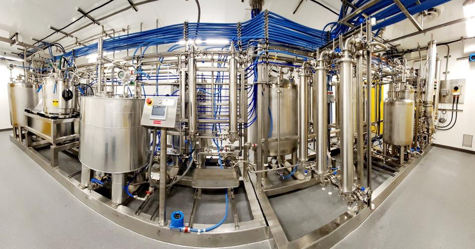 Wide-angle shot of the machinery required to convert dry cannabis into oil from Nextleaf