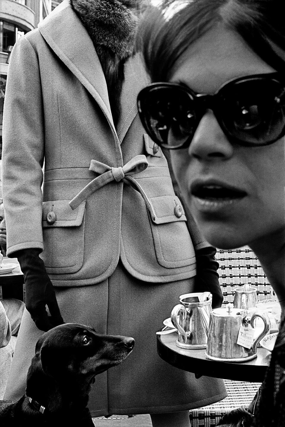 Outside Café Flore in Paris, France, for Harper's Bazaar in 1962.