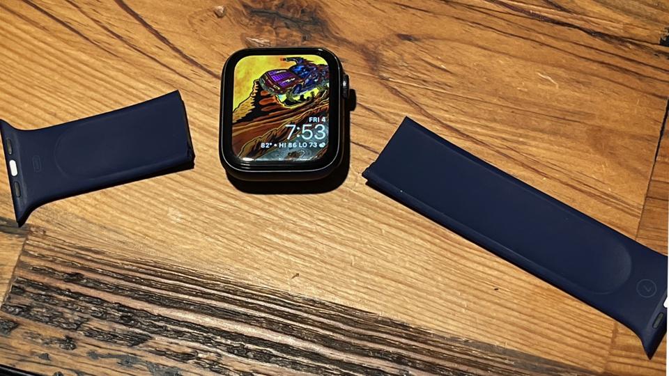 Apple Watch with broken navy blue solo loop strap