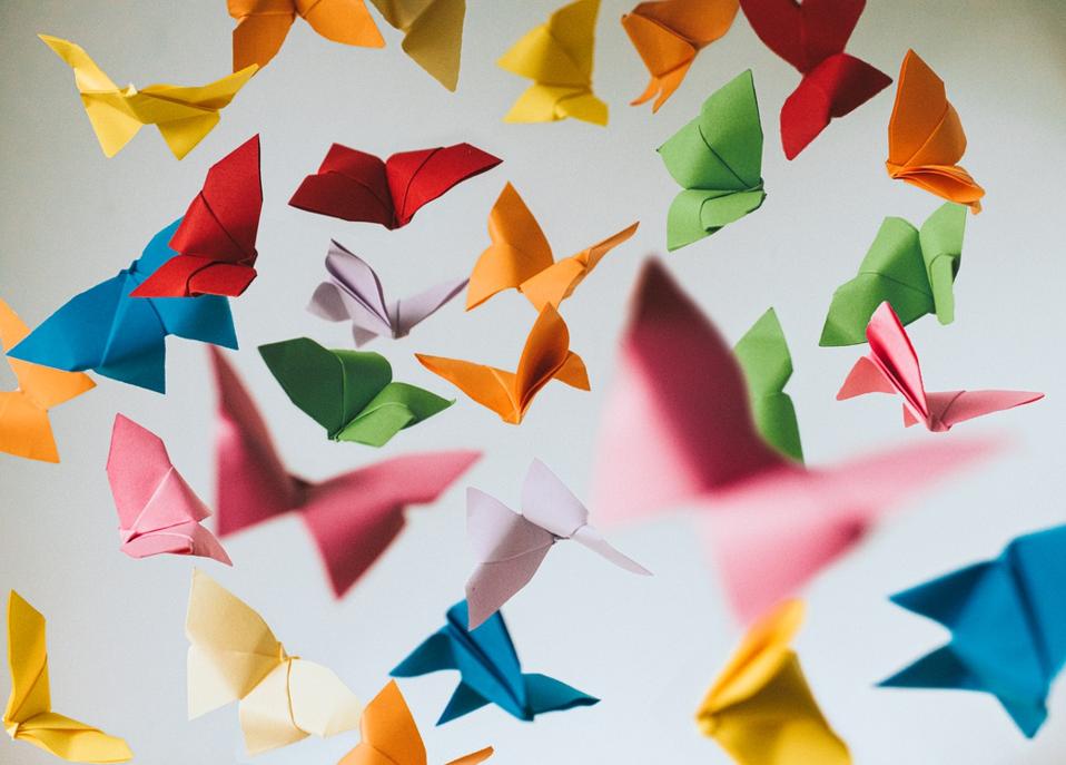 Colorful paper butterflies showing the talent revolution.