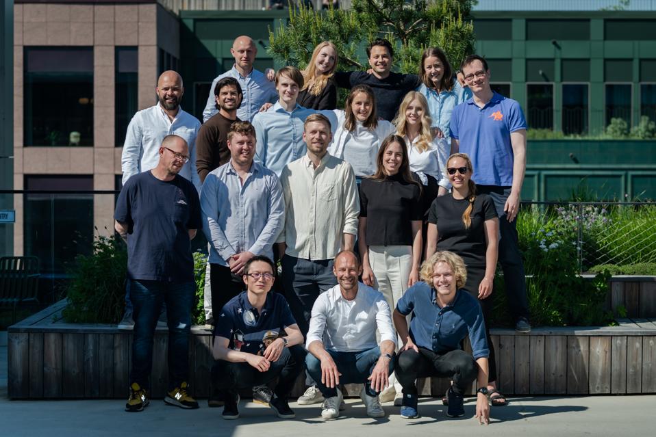 Employees of Curb gathered in a group photo.