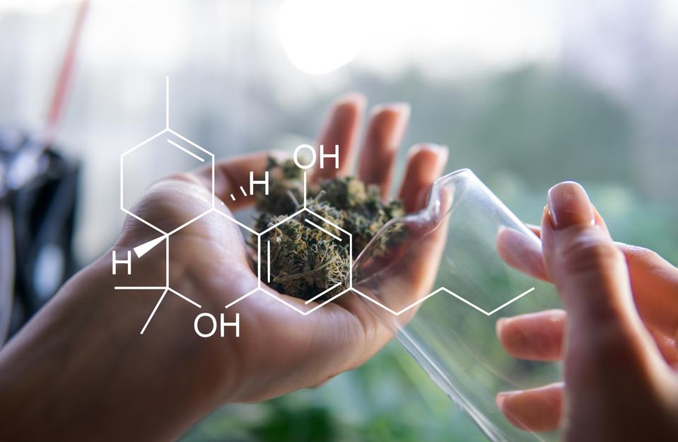 Digital Composite Image Of Cropped Hands Holding Container And Marijuana Joint By Molecular Structure