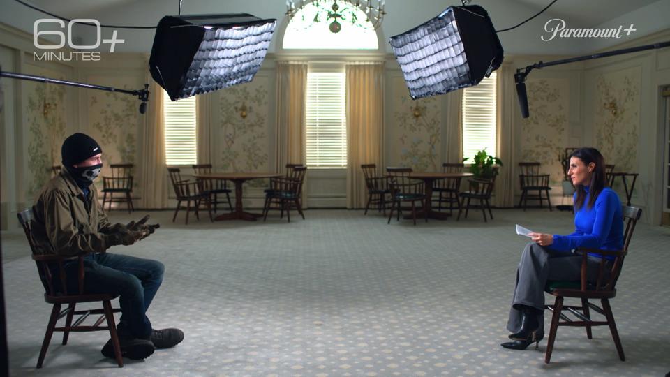 Laurie Segall interviewing man in room